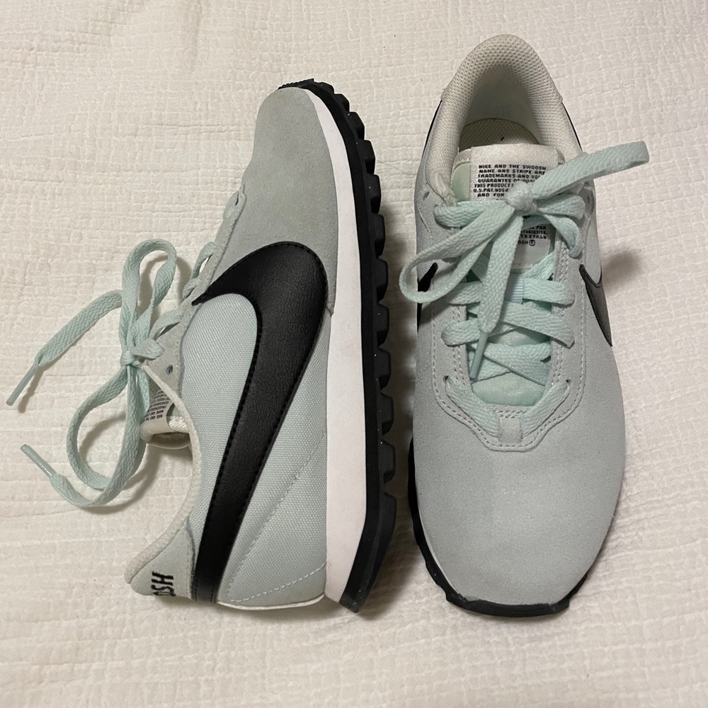 Light blue Nike Internationalists